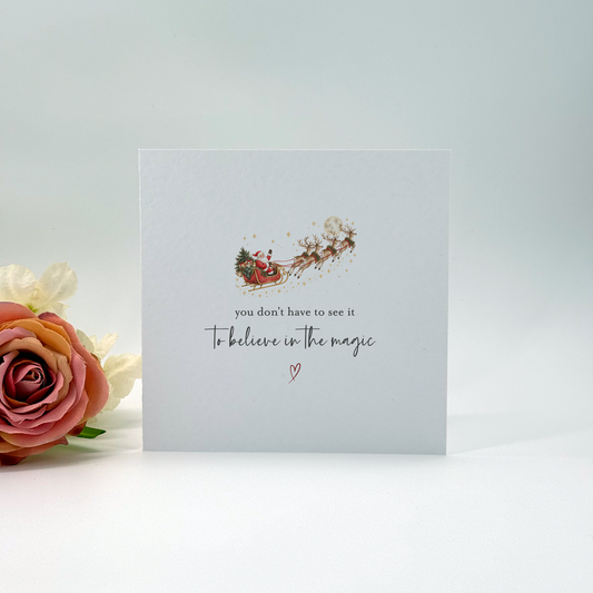 Believe in the Magic Santa & Reindeer Christmas Card